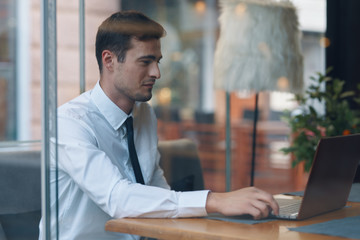businessman working on tablet computer in office