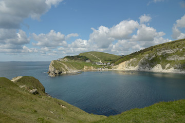 Fototapeta na wymiar View over Lulworth Cove rock formations and strata on the Dorset coast