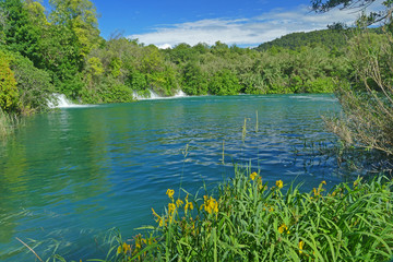 Blue Lake with waterfalls in Krka National Park, Croatia