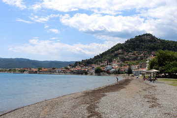 Fototapeta na wymiar Lepanto, Greece - 18 July 2019: panorama of the village seen from the beach