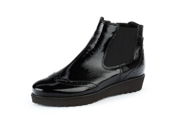 Winter female leather boots isolated on white background