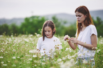 mother and daughter in the field