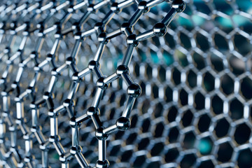 Graphene molecular nano technology structure on a blue background - 3d rendering