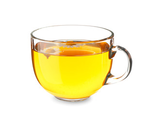Cup of hot chamomile tea on white background