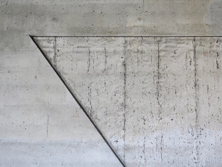 concrete wall with triangle in a train station in Amsterdam