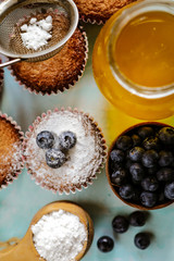 delicious mouthwatering dessert made of muffins, honey and blueberry
