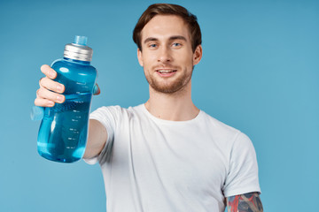 young woman with bottle of water