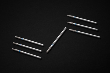 Set of diamond cosmetic bits for skins, manicure, pedicure, healing pedicures, modeling hardened gel or acrylic. Black background