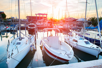 Beautiful sunset in port of sailing vessel in Rimini, Italy.