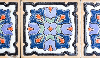Closeup detail of old glazed tiles. background texture