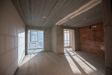 Empty large apartment after builders without repair. Start renovation. New house.