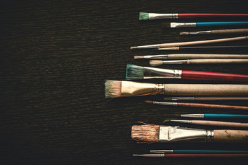 Obraz premium Painting brushes on background.