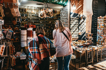 Two women shopping in the Medina Market