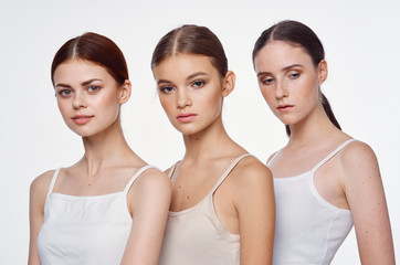 three girls with perfect skin