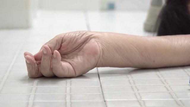 Elderly woman falling in bathroom because slippery surfaces