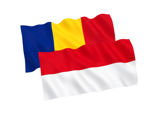 Obraz premium National fabric flags of Romania and Indonesia isolated on white background. 3d rendering illustration. Proportion 1:2