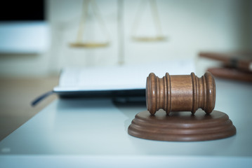 Lawyer businessman working or reading lawbook in office workplace for consultant lawyer concept.