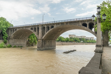 Walk around Tbilisi. Bridges over the Kura River in the capital of Georgia on a sunny day