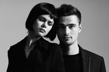 portrait of young man and woman