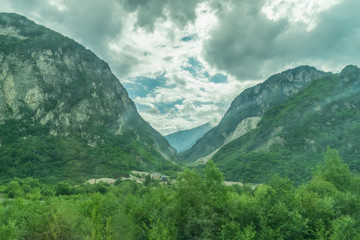 Fototapeta premium Beautiful mountain view with clouds on a sunny summer day