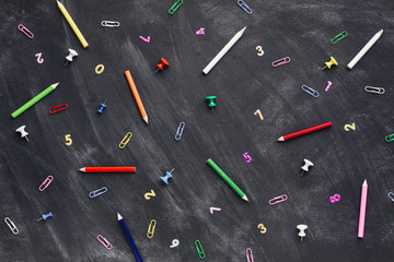 School implements on blackboard