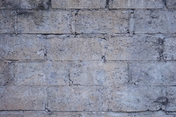 Abstract weathered textured white brick wall background