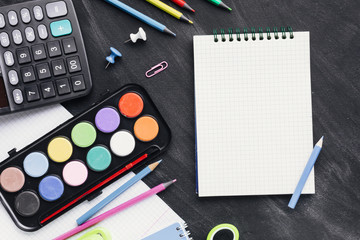 Blank notepad next to watercolor