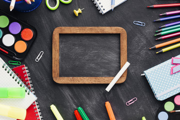 Border of bright stationery and blackboard slate