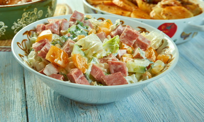 Cabbage salad with ham, cucumber and corn