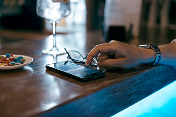 man hand touching a smartphone