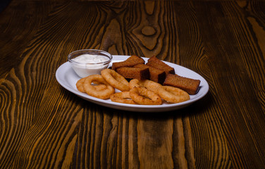 Fired beef tongue served with chili pepper and vegetables