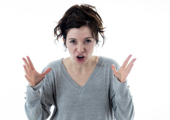 Portrait of a desperate young woman with angry face looking furious. Human expressions and emotions