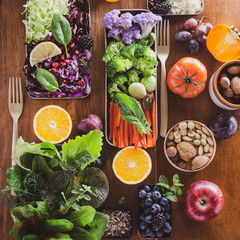 Selective of fall winter antioxidant ingredients and vegetables, cereals rich of anthocyanins, oligominerals for healthy seasonal cooking on colored background