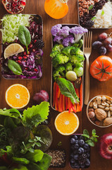 Selective of fall winter antioxidant ingredients and vegetables, cereals rich of anthocyanins, oligominerals for healthy seasonal cooking on colored background