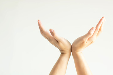 Palm of hands opening in right and left direction; close together at wrists; gesturing like prop up something.