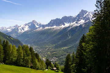 Fototapeta na wymiar City of Chamonix during summer with moutains in the background