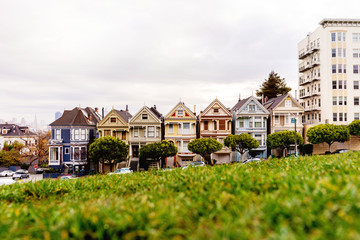 Morning picture of San Francisco most attractive symbol - Painted Ladies buildings at Alamo Square Park.