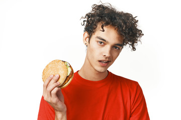 young man with hamburger
