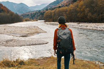  woman near the forest and the river