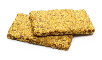 Protein, multi seeds bar with sesame and turmeric, isolated on white background