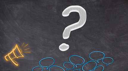 Interrogation point written on blackboard with megaphone and bubbles speech