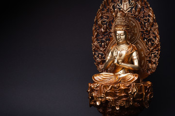 Bodhisattva Guan Yin sitting in the lotus position. - obrazy, fototapety, plakaty