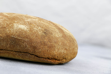 country bread on grey background