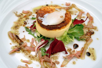 Italian food recipes, ricotta cheese timbale with bacon and egg.