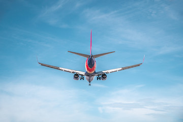 Aviation, travel, air transportation concept. Airplane in blue sky