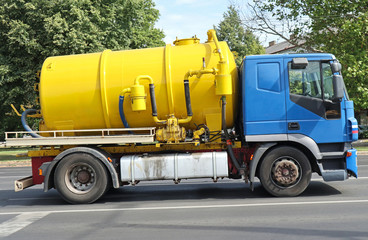 Sewage truck on the street