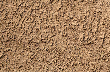 Beige color grungy cement wall texture.