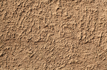 Beige color grungy cement wall texture.