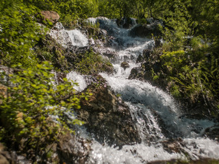 waterfall with splashes and rocks