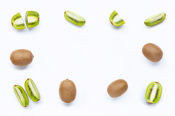 Frame made of Kiwi fruit with a slice isolated on white